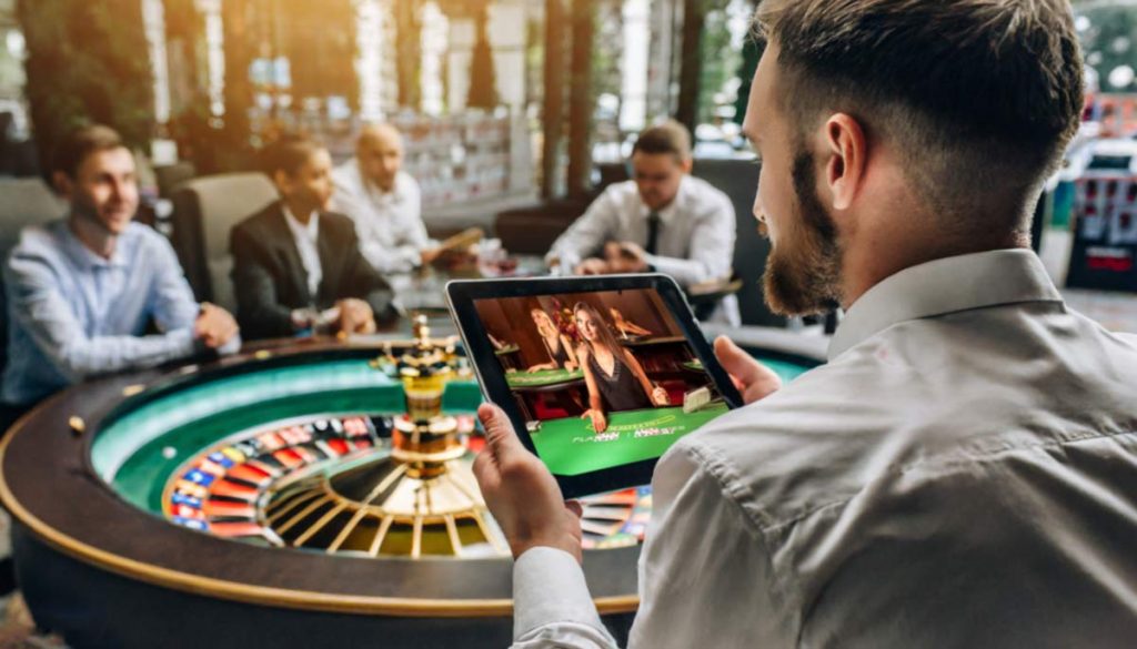 man play at tablet casino with live dealer
